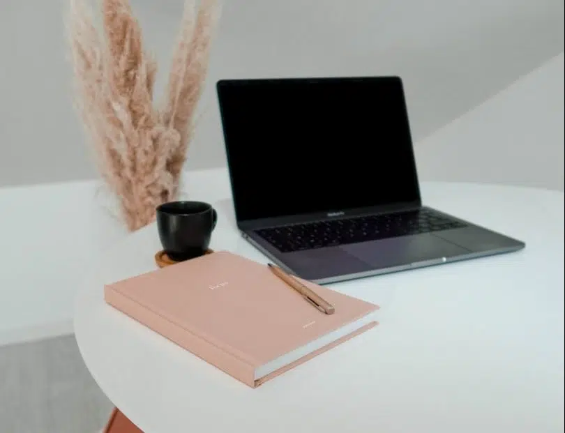 macbook pro on white table